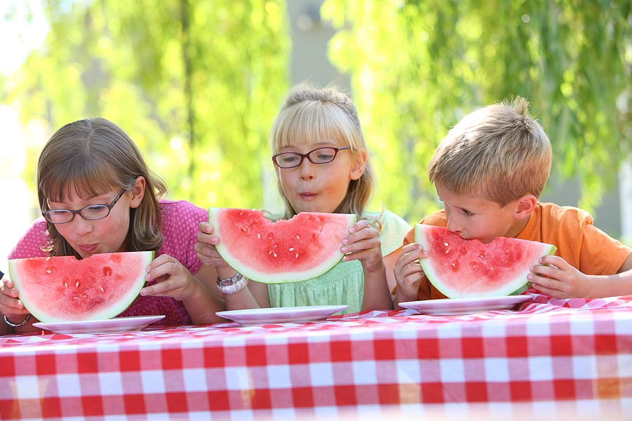 Children eating watermelon